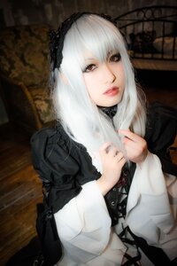 Rating: Safe Score: 0 Tags: 1girl bangs blurry dress gothic_lolita hairband lips lolita_fashion long_sleeves looking_at_viewer red_eyes solo suigintou upper_body User: admin