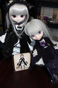 Rating: Safe Score: 0 Tags: 2girls doll dress frills long_hair long_sleeves multiple_girls photo purple_eyes silver_hair solo suigintou wings User: admin