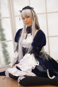 Rating: Safe Score: 0 Tags: 1girl dress frills indoors lips long_hair long_sleeves sitting solo suigintou User: admin