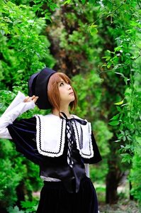 Rating: Safe Score: 0 Tags: 1girl brown_hair capelet day dress hat long_sleeves outdoors plant profile solo souseiseki standing sunlight tree User: admin