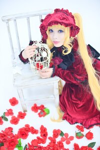 Rating: Safe Score: 0 Tags: 1girl blonde_hair blue_eyes bonnet cage dress drill_hair flower gothic_lolita lolita_fashion long_hair looking_at_viewer pink_rose red_dress red_flower red_rose rose shinku sitting solo twintails very_long_hair User: admin