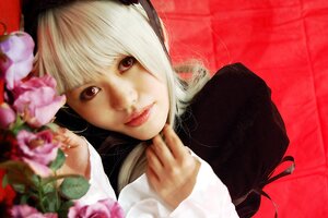 Rating: Safe Score: 0 Tags: 1girl bangs blurry blurry_foreground closed_mouth depth_of_field flower lips looking_at_viewer realistic red_eyes smile solo suigintou User: admin