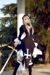 Rating: Safe Score: 0 Tags: 1girl blonde_hair blurry boots dress frills hairband long_hair long_sleeves outdoors solo standing suigintou sword tree weapon User: admin