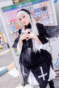 Rating: Safe Score: 0 Tags: 1girl 3d black_dress blurry dress feathered_wings gothic_lolita hairband long_hair photo solo standing suigintou wings User: admin