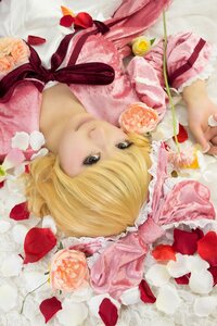 Rating: Safe Score: 0 Tags: 1girl blonde_hair blue_eyes flower hair_ribbon hinaichigo lips lying on_back pink_flower pink_rose red_flower red_rose ribbon rose short_hair solo traditional_media User: admin