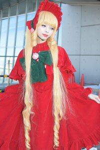 Rating: Safe Score: 0 Tags: 1girl blonde_hair blue_eyes blurry blurry_background bonnet depth_of_field dress drill_hair flower long_hair long_sleeves looking_at_viewer photo red_dress rose shinku solo User: admin