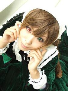 Rating: Safe Score: 0 Tags: 1girl bangs brown_hair dress frills green_dress heterochromia long_sleeves looking_at_viewer red_eyes solo suiseiseki upper_body User: admin