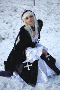 Rating: Safe Score: 0 Tags: 1girl bangs blurry blurry_background depth_of_field dress flower frilled_sleeves frills fur_trim gothic_lolita hairband lips long_hair long_sleeves looking_at_viewer outdoors snow snowing solo standing suigintou winter User: admin