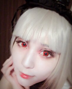 Rating: Safe Score: 0 Tags: 1girl bangs blunt_bangs blurry blurry_background blurry_foreground close-up closed_mouth depth_of_field face lips looking_at_viewer nail_polish red_eyes smile solo suigintou User: admin