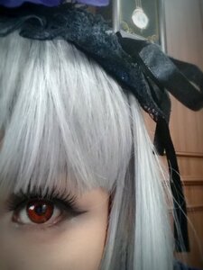 Rating: Safe Score: 0 Tags: 1girl blurry close-up red_eyes solo suigintou User: admin