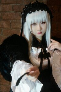 Rating: Safe Score: 0 Tags: 1girl bangs brick_wall closed_mouth dress frills gothic_lolita hairband holding lips lolita_fashion long_hair long_sleeves looking_at_viewer red_eyes solo suigintou upper_body User: admin