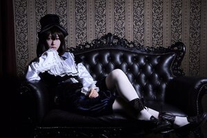 Rating: Safe Score: 0 Tags: 1girl black_hair boots couch dress frills gothic gothic_lolita hat lolita_fashion long_hair long_sleeves sitting solo souseiseki top_hat User: admin