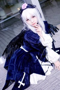 Rating: Safe Score: 0 Tags: 1girl blurry closed_mouth flower hairband long_hair long_sleeves looking_at_viewer red_eyes solo suigintou wings User: admin