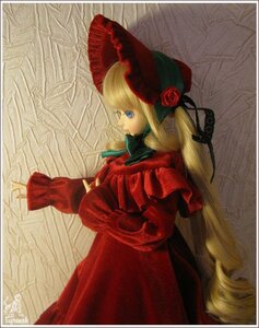 Rating: Safe Score: 0 Tags: 1girl blonde_hair blue_eyes bonnet border doll dress flower gloves hat long_hair long_sleeves red_dress red_rose rose shinku solo User: admin