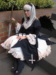 Rating: Safe Score: 0 Tags: 1girl dress frills gothic_lolita lolita_fashion long_hair long_sleeves sitting solo suigintou User: admin