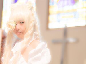 Rating: Safe Score: 0 Tags: 1girl blonde_hair blurry blurry_foreground closed_mouth depth_of_field dress flower hair_flower kirakishou lace lips long_hair solo veil white_flower User: admin