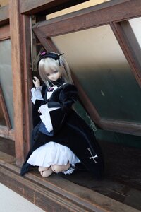 Rating: Safe Score: 0 Tags: 1girl blonde_hair blue_eyes doll dress long_hair long_sleeves sitting solo suigintou white_legwear User: admin