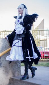 Rating: Safe Score: 0 Tags: 1girl bangs black_footwear boots closed_mouth coat dress full_body fur_trim high_heel_boots high_heels long_hair solo standing suigintou User: admin