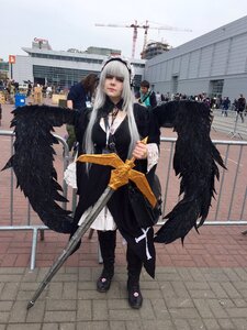 Rating: Safe Score: 0 Tags: 1girl bangs city holding_weapon katana long_hair solo standing suigintou sword weapon wings User: admin