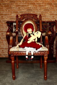 Rating: Safe Score: 0 Tags: 1girl blonde_hair chair doll dress shinku shoes sitting solo stuffed_animal throne User: admin