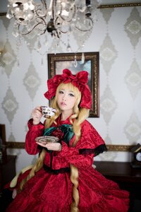 Rating: Safe Score: 0 Tags: 1girl blonde_hair blue_eyes blurry bow cup depth_of_field dress flower holding indoors long_hair looking_at_viewer plate red_dress saucer shinku solo teacup teapot User: admin