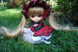 Rating: Safe Score: 0 Tags: 1girl blonde_hair blue_eyes bow doll dress flower frills grass long_hair looking_at_viewer outdoors red_dress ribbon shinku sitting solo twintails very_long_hair User: admin