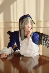 Rating: Safe Score: 0 Tags: 1girl blurry closed_mouth depth_of_field feathers flower hairband indoors lips long_hair long_sleeves looking_at_viewer ribbon solo suigintou wings User: admin