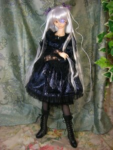 Rating: Safe Score: 0 Tags: 1girl barasuishou black_footwear boots cross-laced_footwear doll dress eyepatch flower gothic_lolita lolita_fashion long_hair pantyhose silver_hair solo very_long_hair yellow_eyes User: admin