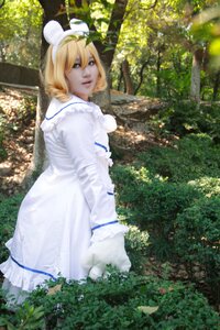 Rating: Safe Score: 0 Tags: 1girl blonde_hair braid day dress grass green_eyes hairband hinaichigo lips looking_at_viewer outdoors solo standing sunlight tree white_dress User: admin