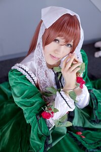 Rating: Safe Score: 0 Tags: 1girl blurry brown_hair depth_of_field dress flower green_dress head_scarf lips long_hair looking_at_viewer smile solo suiseiseki User: admin