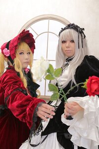 Rating: Safe Score: 0 Tags: 2girls blonde_hair blue_eyes dress flower frills long_hair long_sleeves looking_at_viewer multiple_cosplay multiple_girls realistic red_dress red_flower rose shinku silver_hair suigintou tagme User: admin