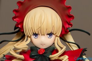 Rating: Safe Score: 0 Tags: 1girl bangs blonde_hair blue_eyes bonnet bow bowtie doll dress drill_hair expressionless flower green_bow long_hair long_sleeves looking_at_viewer red_dress rose shinku sidelocks simple_background solo User: admin