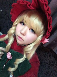 Rating: Safe Score: 0 Tags: 1girl bangs blonde_hair blue_eyes bonnet bow closed_mouth flower hat lips long_hair looking_at_viewer portrait ringlets rose shinku solo User: admin