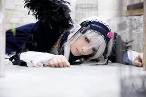 Rating: Safe Score: 0 Tags: 1girl blurry blurry_background blurry_foreground depth_of_field feathers flower frills gothic_lolita hairband lips lolita_fashion looking_at_viewer on_stomach photo red_eyes rose silver_hair solo solo_focus suigintou User: admin