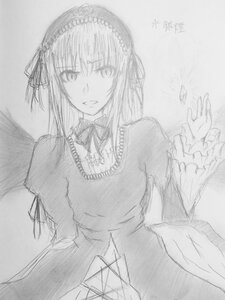 Rating: Safe Score: 0 Tags: 1girl dress frills greyscale hairband image long_hair long_sleeves looking_at_viewer monochrome ribbon simple_background solo suigintou upper_body wings User: admin