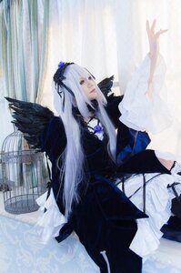 Rating: Safe Score: 0 Tags: 1girl black_wings dress feathers flower frills hairband long_hair long_sleeves ribbon silver_hair solo suigintou very_long_hair window wings User: admin