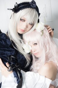 Rating: Safe Score: 0 Tags: 2girls dress flower hairband lips long_hair looking_at_viewer multiple_cosplay multiple_girls suigintou tagme white_hair User: admin