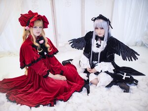 Rating: Safe Score: 0 Tags: 2girls black_wings blonde_hair blue_eyes bonnet curtains doll_joints dress feathers flower long_hair long_sleeves multiple_cosplay multiple_girls shinku silver_hair sitting suigintou tagme wings User: admin