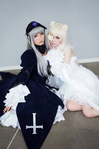 Rating: Safe Score: 0 Tags: 2girls black_dress blonde_hair dress flower frills gothic_lolita lips lolita_fashion long_hair multiple_cosplay multiple_girls silver_hair sitting tagme User: admin