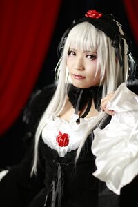 Rating: Safe Score: 0 Tags: 1girl bangs black_dress blurry choker depth_of_field dress flower frills gothic_lolita hairband lips lolita_fashion long_hair long_sleeves looking_at_viewer red_eyes rose solo suigintou upper_body User: admin