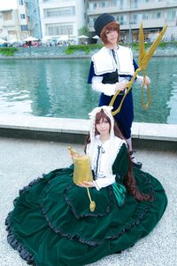 Rating: Safe Score: 0 Tags: 1girl 2boys blue_eyes brown_hair building dress frills green_dress hat multiple_boys multiple_cosplay sitting smile tagme water User: admin