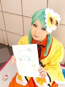 Rating: Safe Score: 0 Tags: 1girl holding holding_paper kanaria letter long_hair paper photo solo tiles User: admin