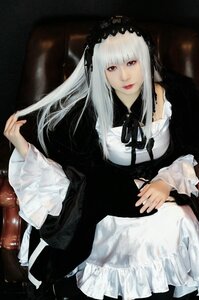 Rating: Safe Score: 0 Tags: 1girl black_ribbon closed_mouth dress frills gothic_lolita hairband lolita_fashion long_hair long_sleeves looking_at_viewer red_eyes ribbon solo suigintou User: admin