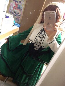 Rating: Safe Score: 0 Tags: 1girl cellphone dress green_dress head_out_of_frame long_sleeves phone photo_(object) solo suiseiseki User: admin