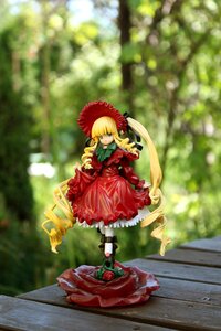 Rating: Safe Score: 0 Tags: 1girl blonde_hair blurry blurry_background bow depth_of_field doll dress drill_hair flower full_body long_hair long_sleeves looking_at_viewer red_dress shinku shoes solo standing very_long_hair User: admin