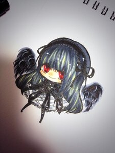 Rating: Safe Score: 0 Tags: 1girl black_wings boots full_body gothic_lolita hairband image lolita_fashion long_hair red_eyes smile solo suigintou traditional_media wings User: admin