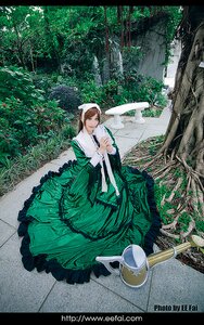 Rating: Safe Score: 0 Tags: 1girl artist_name brown_hair cup dress green_dress hat long_hair looking_at_viewer outdoors smile solo suiseiseki tree User: admin