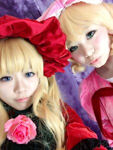 Rating: Safe Score: 0 Tags: 2girls blonde_hair blue_eyes bow flower hat lips long_hair looking_at_viewer multiple_cosplay multiple_girls pink_rose portrait realistic red_rose rose shinku smile tagme User: admin