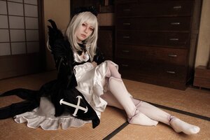 Rating: Safe Score: 0 Tags: 1girl dress gothic_lolita indoors lips long_hair long_sleeves sitting solo suigintou white_legwear User: admin