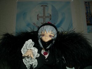 Rating: Safe Score: 0 Tags: 1girl black_wings doll dress feathered_wings feathers flower frilled_sleeves frills hairband long_hair long_sleeves looking_at_viewer rose silver_hair solo suigintou wings User: admin